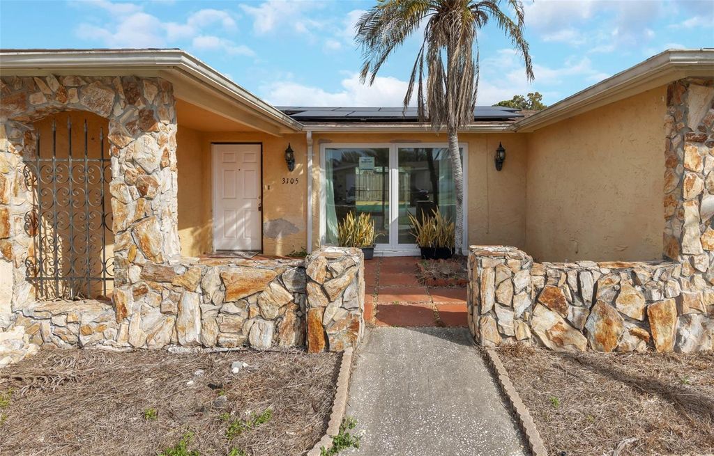 Photo of 3105 Pinon Drive, Holiday, FL 34691 (MLS # TB8477196)