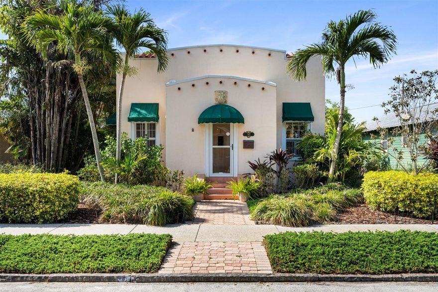 A true 1920s gem in one of St. Petersburg's most sought-after neighborhoods. This classic Mediterranean 2-bedroom, 1-bath residence in coveted Crescent Heights has been lovingly preserved, retaining all of its original hardwood floors, solid wood doors, and the irreplaceable charm that only a century of character can offer. Offered fully furnished and completely turn-key, every detail is already in place — simply bring your suitcase. The private backyard oasis is a standout: professionally designed and installed by a landscape company with a clear vision — maximum lushness, zero maintenance. The result is a verdant, tropical retreat that looks stunning year-round without lifting a finger. The one-car garage has been thoughtfully reimagined as an artist's studio complete with a murphy bed, offering flexible space for creativity, work-from-home, or overnight guests. Ideally situated just minutes from vibrant downtown St. Petersburg, top dining, waterfront parks, and convenient highway access — this is a piece of Old Florida magic that puts everything within easy reach.