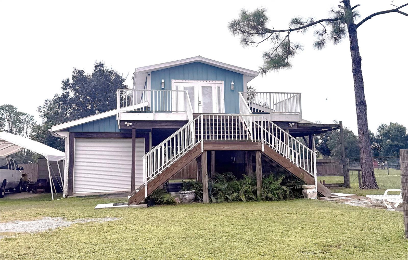 Efficiency Apartment on a Horse Ranch in North Port Estates. A Nature Lover’s Dream! Imagine waking up each day to the sun spilling over acres of emerald pastures, and the air carrying the earthy fragrance of the countryside. Surrounded by five magnificent preserves literary offering over 120 miles of trails for hiking, fishing, hunting and horse back riding. This country unit is fully furnished from soup to nuts, so all you need to bring is your cloths and your sense of adventure.
·        Split Air Conditioning – Stay cool in summer and cozy in winter with modern climate control.
·        Flat Screen TV – Unwind with your favorite shows or a movie night after a day spent exploring.
·        Ceiling Fan – For gentle breezes and an ambiance that invites relaxation.
·        Large Deck – Overlooking the horse pastures, the deck is the ideal spot for morning coffee, evening sunsets, or simply soaking in the sights and sounds of rural life.
·        Washer and Dryer Downstairs – Laundry is a breeze, freeing up time to enjoy the ranch and its surrounds.
·        Fully Furnished – From kitchenware to cozy bedding, every item has been thoughtfully selected so you can settle in with zero hassle. Â
One of the apartment’s greatest advantages is its location. While it feels miles away from the hustle and bustle, the quick access to I-75 ensures you’re never far from necessity. Commuting to work, heading out for shopping, or meeting friends for dinner is effortless, making this the ideal home for those who want rural tranquility without sacrificing urban convenience. The monthly rental rate includes: Electricity, Water, Internet, and outside Pest control.  You can focus on living and peace of mind because these cover the essentials.
·        Horse Stable Available – Lease a private stable for your own horse. Choose from 3 different packages.