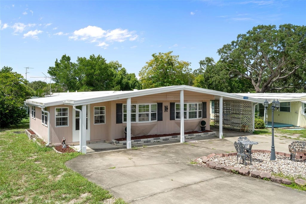 Photo of 7459 Highpoint Boulevard, Brooksville, FL 34613 (MLS # TB8548547)