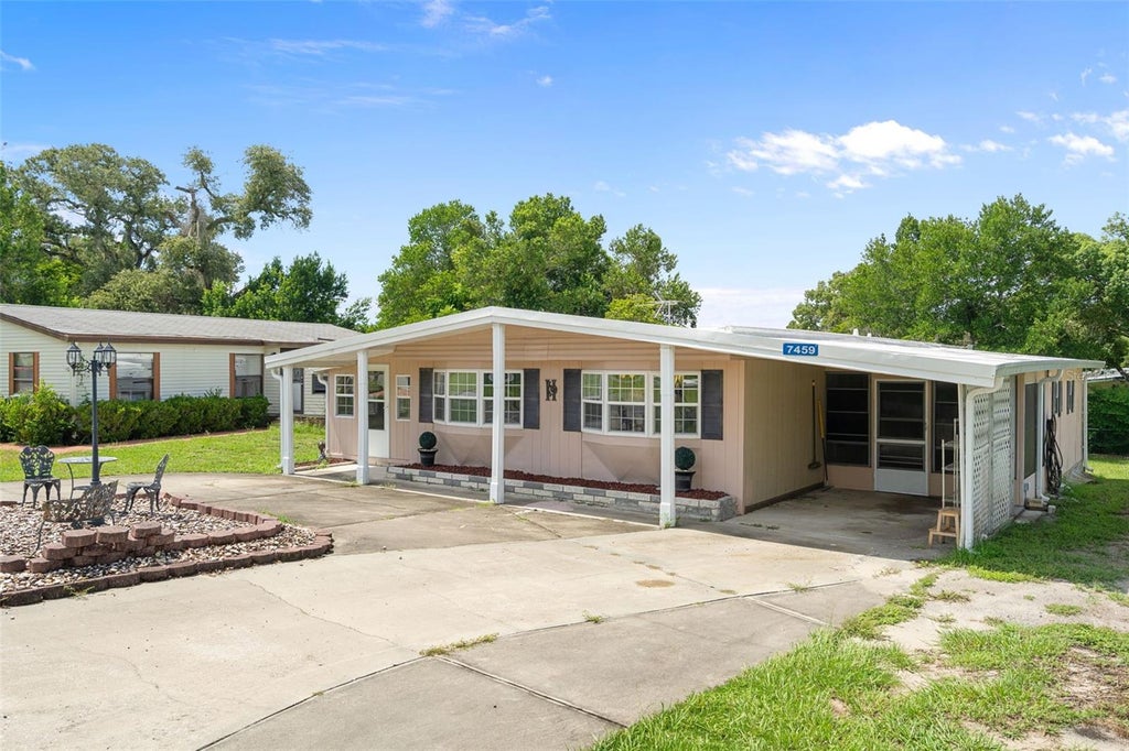 Photo of 7459 Highpoint Boulevard, Brooksville, FL 34613 (MLS # TB8548547)