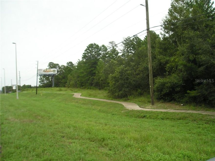 This 9.03 Acres (mol) has lots of uses under C-2 and C-3   zoning  , great location  for development ,  This 9.03 Acres parcel of  property also includes Billboard income , has lots of possibilities , Has great potential for  Commercial  uses  light and heavy , Apartments/ Multi-Family !!
