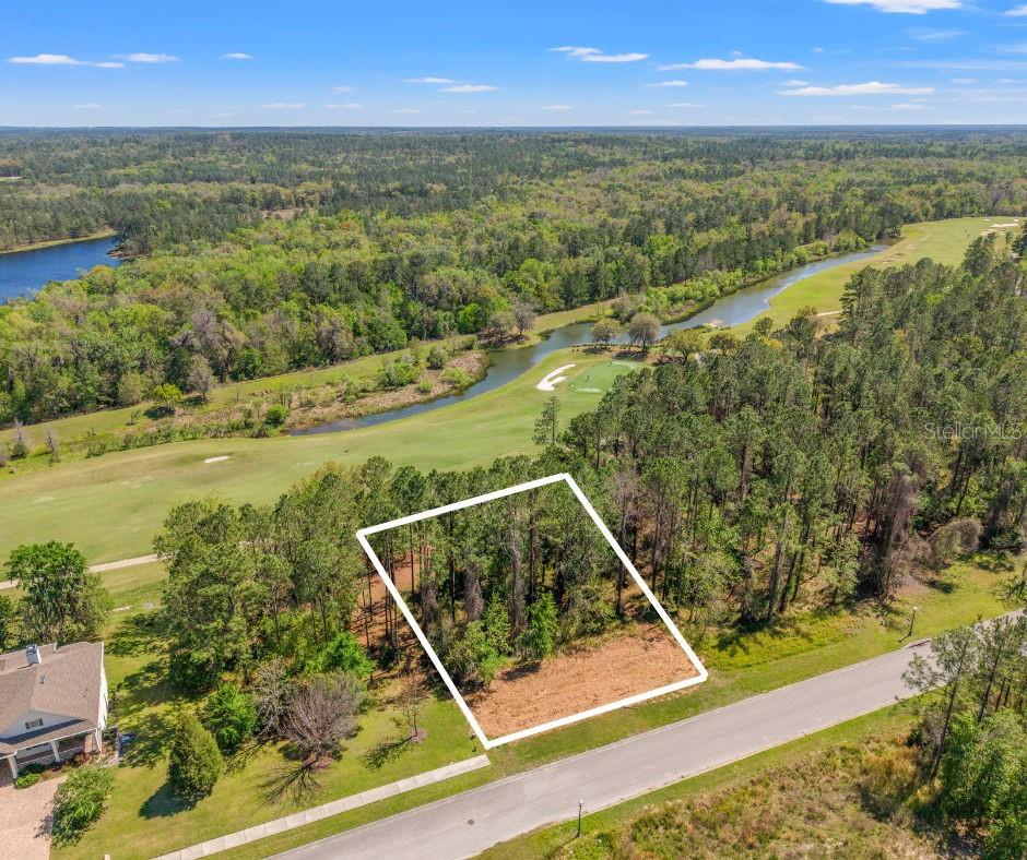 The perfect opportunity to build your dream home in this prestigious Southern Hills Plantation Club! This vacant lot offers breathtaking views of the 11th green, providing a serene and picturesque backdrop for your future residence. Nestled alongside a triple lot to the left, with no plans for development on the neighboring property, you'll enjoy an abundance of space and privacy—a rare find in such an exclusive setting. Surrounded by dramatic elevation changes, sweeping views of the manicured golf course and on a cul-de-sac road, this lot is an ideal canvas for creating a custom home tailored to your vision. Don't miss your chance to claim this prime piece of real estate in a sought-after location!