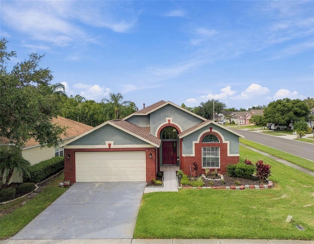 Photo of 30600 Nickerson Loop, Wesley Chapel, FL 33543 (MLS # TB8510471)