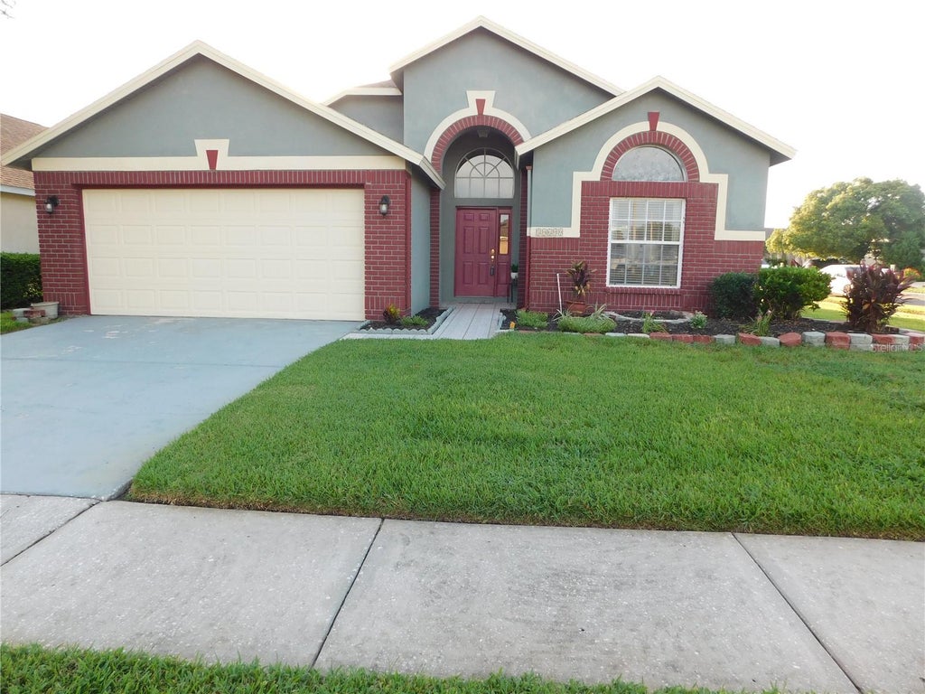 Photo of 30600 Nickerson Loop, Wesley Chapel, FL 33543 (MLS # TB8510471)