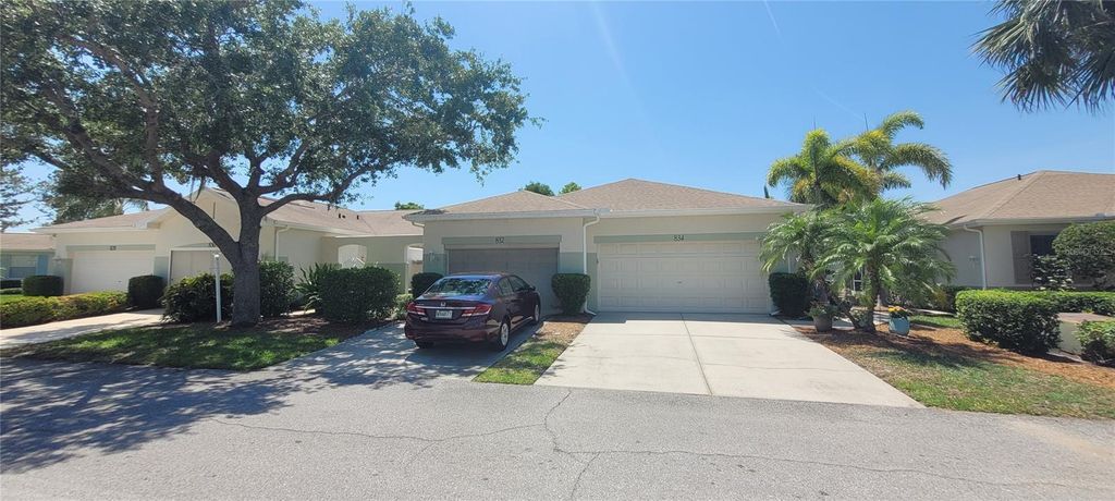 Photo of 834 Tremont Greens Lane #137, Sun City Center, FL 33573 (MLS # TB8469111)