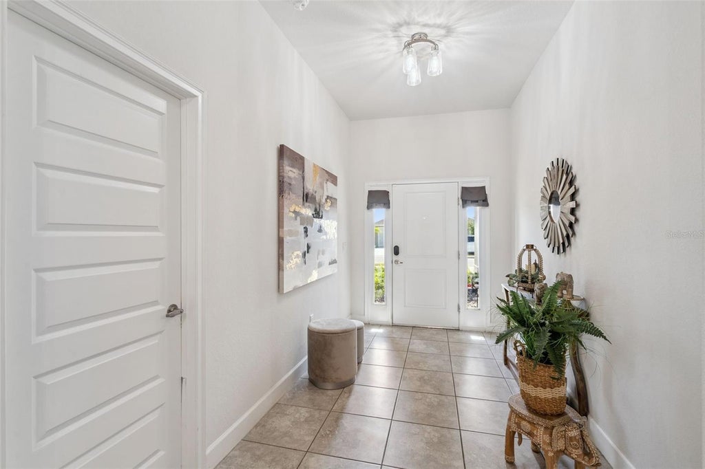 Photo of 1106 Citrus Landings Boulevard, Davenport, FL 33837 (MLS # O6422698)