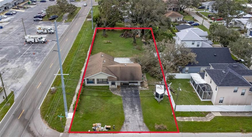 Exceptional investment opportunity in South Tampa! This oversized 0.34-acre corner property consists of four lots at the intersection of
Manhattan Ave and Lancaster St and is zoned CN (Commercial Neighborhood), offering outstanding redevelopment potential in a highly desirable
location. Just minutes from MacDill AFB, Dale Mabry Hwy, Bayshore Blvd, Gandy Blvd, Picnic Island Park, and popular local dining, this site
combines strong location appeal with flexible zoning options. The existing 2-bedroom, 2-bath home provides the opportunity for renovation,
income potential, or full redevelopment. .Schedule your private showing today!
