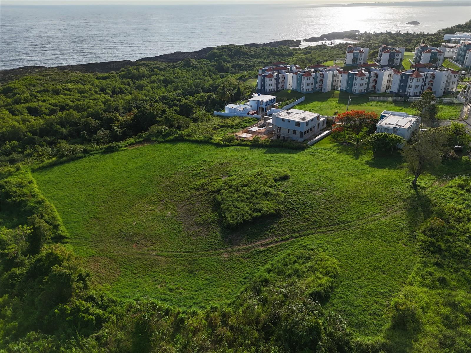 A rare opportunity to own an oceanfront 2-acre parcel steps from the iconic Mar Chiquita Beach. Zoned Residential-Tourism (RT), this property is perfect for a multifamily development, condo project, boutique hotel, eco-retreat, luxury estates, or short-term rental investment. One of the last remaining oceanfront parcels of this size in ManatÃ, with direct paved road access and panoramic views of the Atlantic Ocean. Strong long-term upside in a high-demand coastal area with expanding development activity. Zoned RT – Residential Tourism - Paved Access via Calle Lolita Natal - Electricity & Water Nearby - 45 Minutes from San Juan.