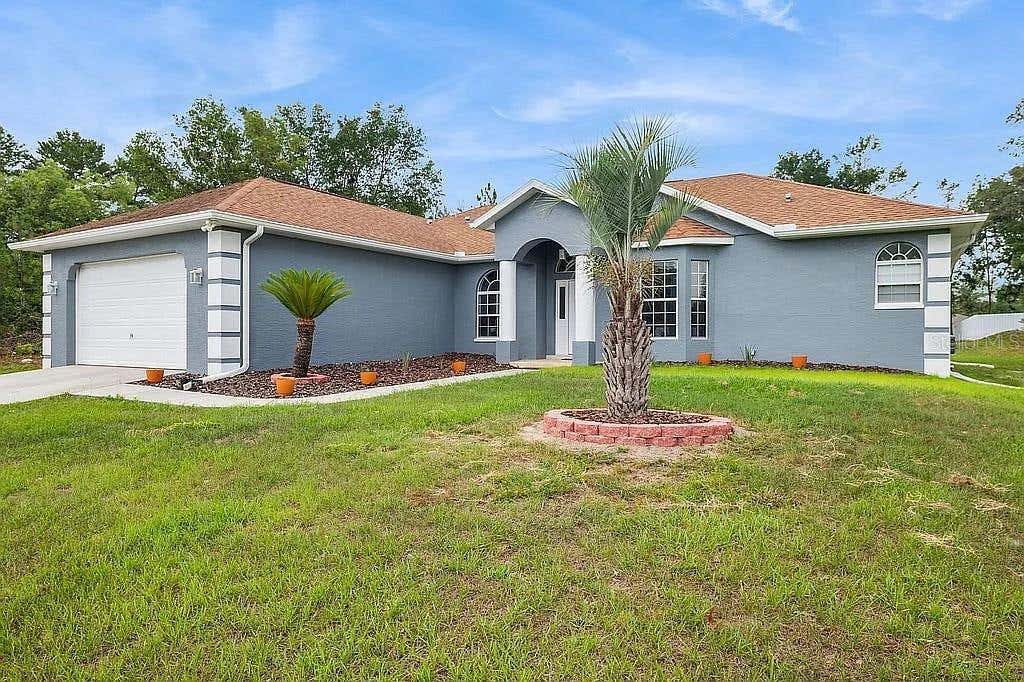Photo of 8628 SW 133rd Lane Road, Ocala, FL 34473 (MLS # O6431597)