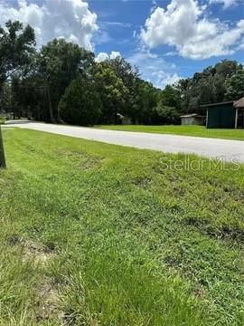 Photo of 26408 Rolling Acres Drive, Brooksville, FL 34602 (MLS # L4963477)