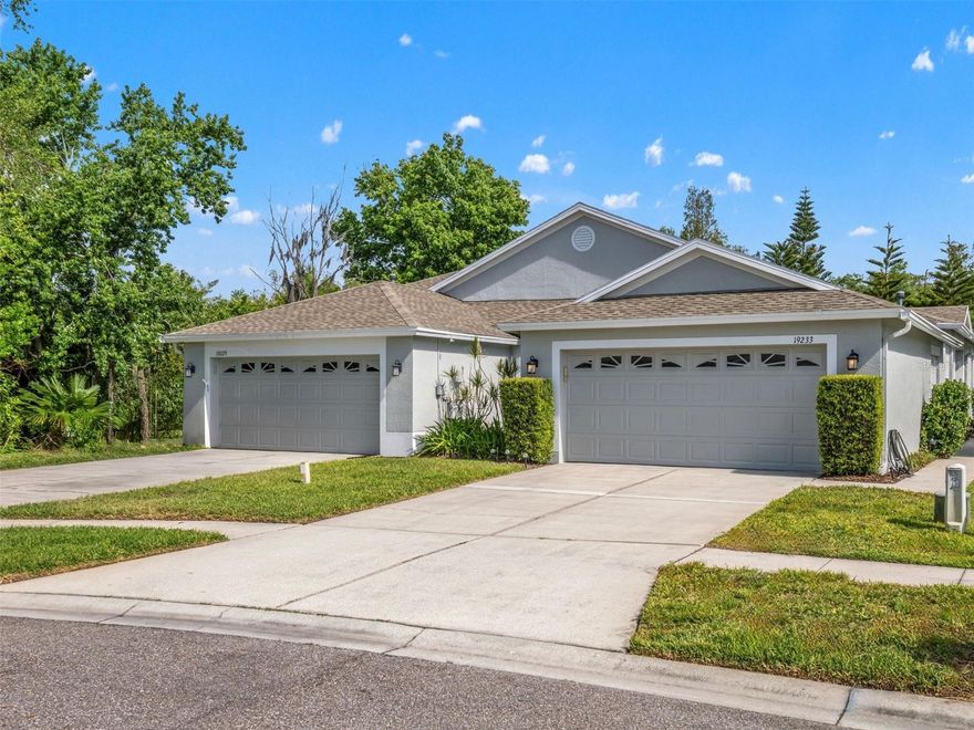 Nestled on a quiet cul-de-sac in Tanglewylde, the gated villas of Oakstead, this move-in-ready, meticulously maintained residence offers effortless, low-maintenance living. Featuring 2 bedrooms, 2 full baths, a spacious living room with rear porch access, family room, and a 2-car garage, this thoughtfully designed home offers over 1,500 square feet with an open and functional layout.
The well-appointed kitchen showcases ample cabinetry, generous upgraded stone countertops, and gas cooking, seamlessly connecting to the dining area and family room, ideal for everyday living and entertaining. Sliding glass doors open to a private rear patio framed by mature trees, creating a peaceful outdoor retreat perfect for enjoying Florida’s year-round lifestyle.
The primary suite is designed for comfort, offering two walk-in closets, a linen closet, dual vanities, separate shower, and a private water closet. Residents appreciate the low HOA and true lock-and-leave convenience, with gated entrance, maintenance coverage that includes roof, exterior paint, lawn care, and irrigation.
Updates include a newer roof (HOA responsibility), refreshed landscaping, a newer interior A/C unit (2024), hot water heater, (2020) newer microwave and fresh paint in the primary suite, primary bath, kitchen, and family room.
Oakstead is a highly sought-after community known for its exceptional amenities, including a clubhouse, resort-style pool and kiddie pool, fitness center, playground, tennis/pickleball courts, basketball courts, meeting space, recreational field, scenic walking trails, and a vibrant calendar of community events.
Ideally located near medical facilities, Publix, shopping, restaurants, dining, and major highways, this home is available for quick move-in. Schedule your private showing today!