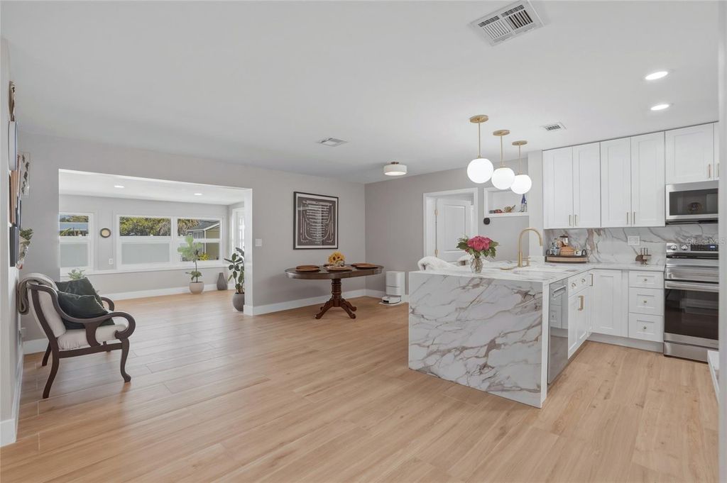 Photo of 411 42nd Avenue NE, St Petersburg, FL 33703 (MLS # TB8503079)