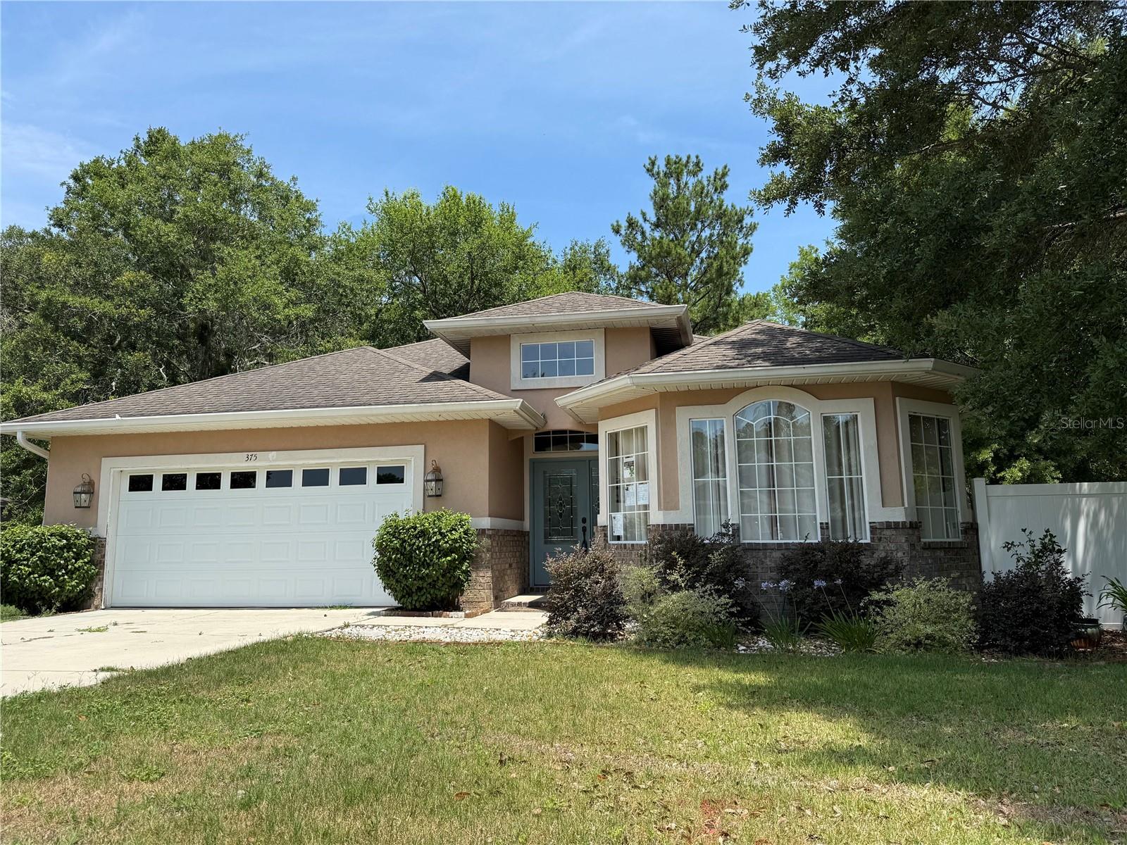 Huge Price Drop by MOTIVATED SELLERS: 4BR/2BA - 2,311 SF Heated and Cooled; 3,184 SF Under Roof, home on 0.34 acre prime lot in "The Preserves at Laurel Lakes", Lake City FL, just minutes west of I-75/I-10 corridor with a short drive to town and nearby cities Jacksonville, Tallahassee and Gainesville. This big, beautiful home has privacy fencing and abuts a wooded preserve area of this neighborhood, and is located next to the community pool. No building will occur behind this lot, which provides a premium natural backyard lifestyle. The wetlands required delineation were conserved as a natural benefit to this beautiful and diverse development. Grab your fishing pole too, for fun outdoor time with kids and grands in the many ponds and small lakes designed herein.
Stepping into the high-ceiling sizable foyer with the formal dining room (previously used as a music room/library), right next to the large kitchen with lots of cabinets and granite countertop space for meal prepping. Gas oven range has room for 4-6 pans all cooking at once. This is an open floor plan area with the large family room in the contiguous space. There is a unique double-sided gas fireplace that is shared with the outside screened in rear porch, so you can enjoy toasty fires in either space simultaneously, cozied up on chilly Florida days inside or out. February feels like our coldest month and Lake City will have freezing temps at times. The split floor plan has laundry with utility sink and BR1/BR2 on the front side of house; with a walkthrough full bath to other side of home hallway where BR 3 and the master suite are located. The two car, front facing garage leads into the large foyer from a interior side entrance.
The master suite features a spacious en-suite bathroom and two walk-in closets, tray ceiling, French doors leading out to back porch, and beautiful view of the preserve area. This is a perfect owners retreat for quiet enjoyment.
The Preserves offers a community club house, pavilion picnic and grill area, recreation area including a sparkling pool, children's play area, sand volleyball, tennis courts. There is a RV and boat parking area, and the entire neighborhood was designed around all the natural and wetlands preservation areas of the area. The homes in this neighborhood are all different looking, so this is not a cookie cutter subdivision. It's very nice to see all the different homes and makes for an enjoyable walk or ride around.
Currently the home needs some TLC and is a super clean palette for the buyer wishing to customize their own living space. This home is aligned and waiting for new owners to personalize and settle. The AVERAGE Home Value in the neighborhood is 428k as of 07/14/25