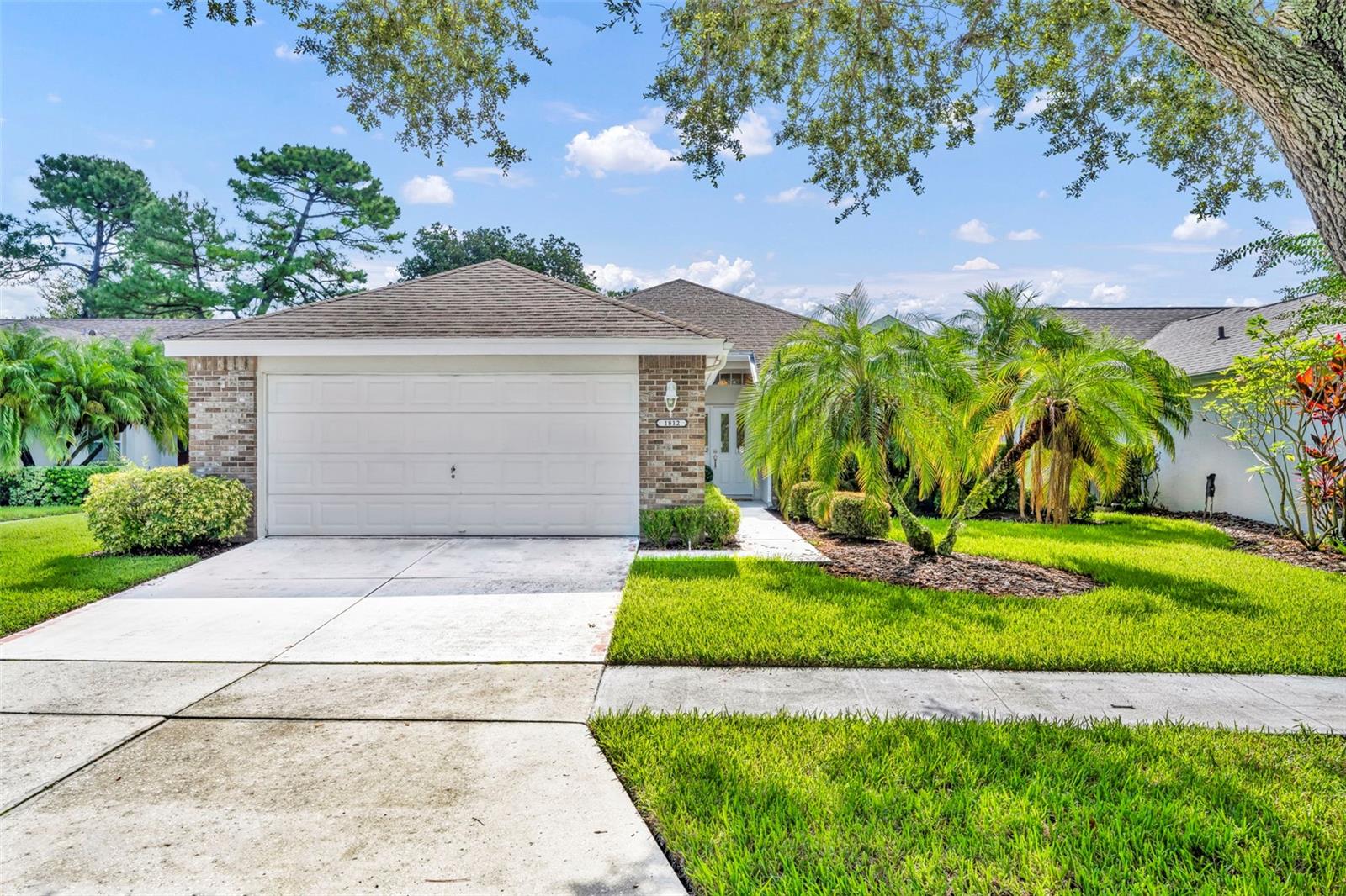 Experience an amazing golf course living in this charming turn-key 2-bedroom, 2-bathroom home nestled in The Country Club of Mt Dora, right on the 7th green. As you step inside, you’ll be greeted by a professionally decorated home with a spacious living room with vaulted ceilings, a large dining area with office space and a bright kitchen with updated white cabinets- and all stainless steel appliances ( brand new microwave) included- great for entertaining. Brand new carpet throughout 2025. Freshly painted entire house 2025 . Laundry room updated new laundry tub and faucets 2025 and washer and dryer included. The master suite is a true retreat, featuring a walk-in closet and a bathroom with updated new cabinet doors with dual vanities, a soaking tub, and a large separate shower. Step outside to the expansive lanai (with all new upgraded screens) and take in the stunning views of the golf course - a lovely setting for your morning coffee or evening relaxation. Can be a 4 season room. All cabinets updated with new doors throughout 2025 . A two-car garage adds to the convenience. Painted 2025 HVAC all new 2019. Brand new screens on every window and lanai 2025. Enjoy an active lifestyle with access to the
18-hole golf course, tennis and pickleball courts, a pool with hot tub, clubhouse, restaurant, and pro shop, all within the community. Ideally situated just minutes from the 429-toll road and new Wekiva Parkway, you’ll have quick and easy access to Orlando, 35 minutes to Sanford airport and 45 minutes to MCO airport, theme parks, and Florida’s beautiful beaches. This home is in a prime location - schedule your showing today!