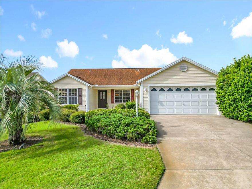 **NEW ROOF PRIOR TO CLOSING** Welcome to this 3 bedroom, 2 bathroom home located in the highly desirable Village of Hadley in The Villages, FL. This popular Amarillo floor plan offers comfortable living with smart updates and a fantastic location - just 8 minutes from Lake Sumter Landing, where you'll find shopping, dining, and nightly entertainment. Prime location! The home features a brand-new hot water heater, HVAC system installed in 2018, and a fresh coat of interior paint. For added peace of mind, the roof will be replaced before closing. Enjoy Florida living on the covered and screened-in lanai, which offers excellent privacy thanks to mature landscaping and tall hedges. The yard is well-maintained and beautifully landscaped, adding to the home’s overall curb appeal. Inside, the spacious master suite includes dual walk-in closets, dual vanity sinks, and a tiled walk-in shower with a built-in bench. The split floor plan provides privacy for guests, while the open living and dining areas create a bright, welcoming space. This home is perfectly located for enjoying all that The Villages lifestyle has to offer.