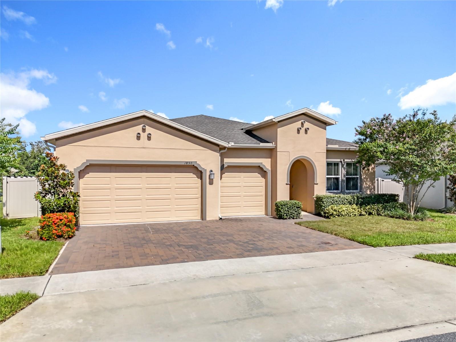 One or more photo(s) has been virtually staged. Welcome to your dream home in the desirable Arden Park North community. Built in 2019, this stunning 4-bedroom, 3-bathroom residence offers over 2,500 square feet of thoughtfully designed living space. From the moment you step inside, you'll appreciate the wide-open floor plan that seamlessly connects the living, dining, and kitchen areas—perfect for everyday living and effortless entertaining. This modern kitchen impresses with sleek cabinetry, granite countertops, stainless steel appliances, and a spacious island for bar seating. Durable vinyl plank flooring extends throughout the entire home, offering a clean, contemporary look while remaining carpet-free for easy maintenance. Each bedroom is generously sized, including a well-appointed primary suite featuring a walk-in closet and a private ensuite bathroom. Step outside to your enclosed back patio—ideal for morning coffee or intimate gatherings. Enjoy the fenced backyard that provides privacy, peace of mind, and a partial lake view. Additional highlights include smart home technology, a paid-off solar panel system for year-round energy efficiency and savings, and a whole-home water softener and filtration system for pure, high-quality water throughout. Move-in ready and designed for modern living—don't miss your opportunity to make this stunning home your own. Schedule your private showing today!
