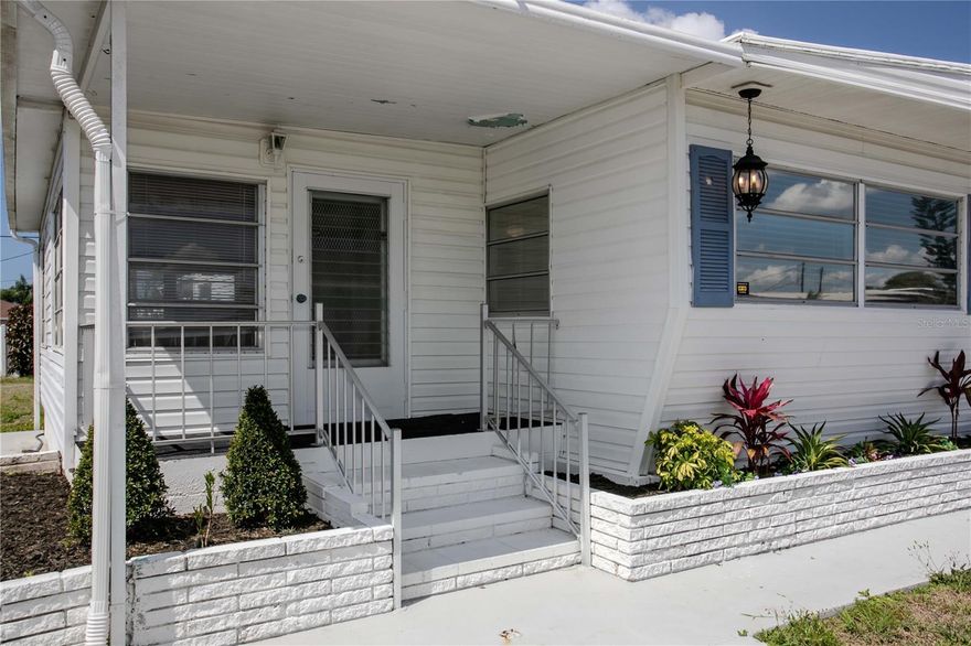 Live the Florida lifestyle in this 2-bedroom, 2-bath, 1,104 sq ft double-wide in the highly desired Heather Hills 55+ manufactured home community in Bradenton. This land-owned home sits on a premium corner lot with no HOA fees and no park applications—enjoy true ownership, lower monthly costs, and an easy move-in process.  

A spacious circular drive and carport provide covered parking for up to five cars, perfect for visitors, multiple vehicles, or a golf cart. Fresh interior paint and luxury vinyl flooring in the main living areas create a clean, move-in-ready feel, and a new roof installed in 2025 offers valuable peace of mind for years to come. Central A/C keeps things comfortable year-round, while the large Florida room expands your living space for morning coffee, hobbies, or relaxing with friends. The kitchen includes a convenient pantry and a new refrigerator, giving you extra storage and modern functionality.  

Both bedrooms feature built-in dressers, and the primary suite adds a walk-in closet plus an additional built-in closet for excellent storage. The primary en suite bath includes a tub/shower combo and linen storage, while the updated guest bath offers a stylish barn door, step-in shower, and its own linen storage—ideal for guests or everyday convenience. The home is unfurnished, giving you a blank canvas to bring your own furniture and style.  

Heather Hills is a dog-friendly, active 55+ community known for its convenient central Bradenton location and friendly neighbors. You’ll be minutes from shopping, medical offices, restaurants, and just a short drive to Bradenton’s world-famous Gulf beaches and waterfront entertainment. Start enjoying affordable, low-maintenance living close to everything the Gulf Coast offers—schedule your private tour of this corner-lot Heather Hills home today.