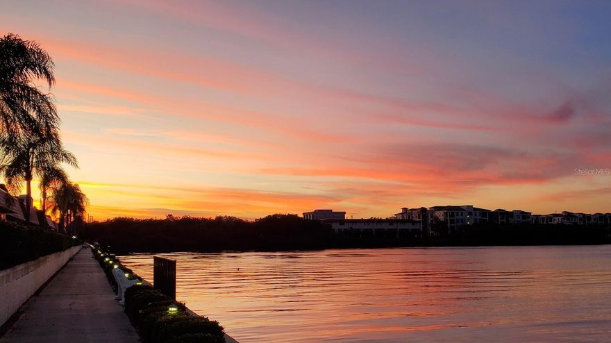 Come to Clearwater, the weather is beautiful and the views from this centrally locate villa are phenomenal! Enjoy waking up everyday to wide open water views and enjoy your coffee inside or outside, both are great  Treat yourselves to the fantastic Florida lifestyle. This gated community features a heated pool, putting green, fishing dock, lighted waterfront pathway around the community, social activities galore, a fitness center and it's only a 5 minute drive to watch the Phillies Spring training games.  This fully furnished condo hasn't been rented before and everything, yes everything, is brand new! Available now through April 2026. Split bedroom plan, one Queen and one King size bed, walk-in closet in the primary! New washer and dryer in the condo and parking is just outside the front door. Don't wait, call today and enjoy your winter in warmth and style!  Owner will consider a 6 - 12 Month lease at reduced rate.