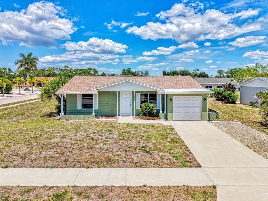 Beautiful & Move-in Ready! Welcome to this cozy 2 bedroom, 2 bath home on a prime corner lot in the Gardens of Gulf Cove in Port Charlotte. This fully updated Port Charlotte home for sale combines comfort, style, and smart upgrades that make daily living easy. Major improvements include a new roof (2023), new A/C (2022), and a hot water heater (2018), giving peace of mind from day one. Inside, you’ll find a bright and inviting living room that flows into a beautifully updated kitchen. The kitchen stands out with 36-inch cabinets topped with crown molding, a tiled backsplash, newer stainless steel appliances (2019), recessed lighting, and a convenient pass-through window to the lanai—perfect for indoor-outdoor living. The dining room features a French door that opens to a screened lanai with durable pebbletech flooring, creating a great space to relax and enjoy the Florida breeze. This home offers two master suites, each designed for comfort and privacy. The primary master bedroom includes a ceiling fan, a spacious closet, and custom-made barn doors that lead to a private bathroom. The bathroom features a custom Roman shower with glass doors, wood cabinetry, and granite countertops for a clean, modern look. The second suite also includes a ceiling fan and a walk-in shower with a marble countertop and wood cabinet, offering style and function. Throughout the home, new luxury vinyl flooring adds a fresh and cohesive feel. Additional features include an inside laundry room with washer and dryer included, adding convenience to your daily routine. Located in the desirable Gardens of Gulf Cove, this property comes with a low HOA and access to excellent amenities such as a clubhouse with a small gym, tennis courts, a community pool, and sidewalks throughout the neighborhood. This Port Charlotte home delivers updated features, outdoor enjoyment, and a relaxed community setting for Florida living.