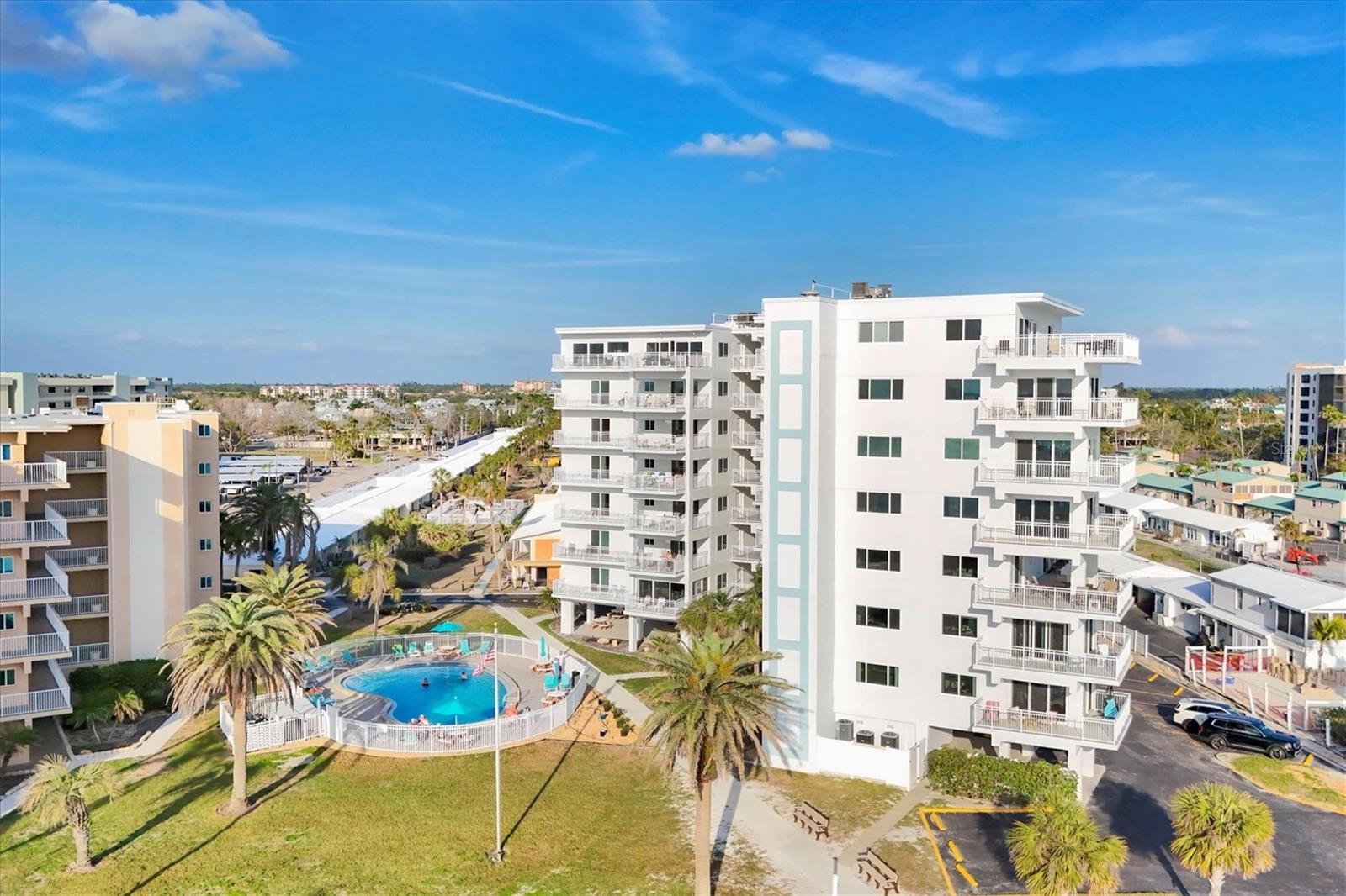 BRAND NEW A/C The Beach, Elevated this updated 5th floor high above the Gulf a Golden opportunity to own directly on Siesta Key Beach. Rarely available perfectly situated direct beach front with a weekly rental program managed on site 52 weeks a year. Endless BEACH VIEWs in the wrap around deck specific to this unit on the 5th floor you will be well protected from high tides. NEW HURRICANE WINDOWS and/or shutters 2023 new railings on the balconies and fresh interior and exterior paint assessments have been paid. This unit comes turnkey furnished a top performer when rented Unit 502 rental income can be verified final net 2024 $70,335. You will love the large wine refrigerator great for chilling soft drinks and water too enjoy on your open balcony hovering over the beach cannot get closer that this and still able to sleep at night. You will appreciate the extra owners storage unit on the first level of the building convenient for your personal beach chairs and umbrellas. Jamaica Royale features 3 swimming pools and beach side chairs for relaxing on Crescent Beach. Central island location for easy access to south and north villages on Siesta key shopping dining and live entertainment. Access the trolley for free rides to either end of Siesta Key. This unit is rented through July 2025. This property has the "MILESTONE" inspection for Jaimaica Royale.