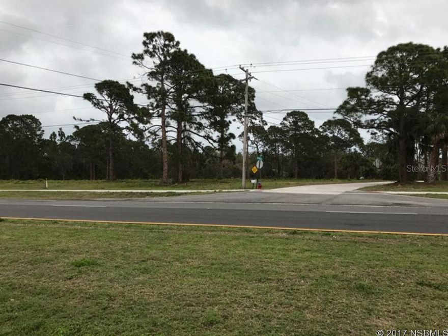 excellent buildable commercial lot with city water and gravity sewer adjacent to Lot, cleared and high and dry great frontage south of Winn Dixie shopping center and north of Publix shopping center. Owner will consider purchase money mortgage. Listing Agent is President of Corporation that owns the property ;Water: Available at Site