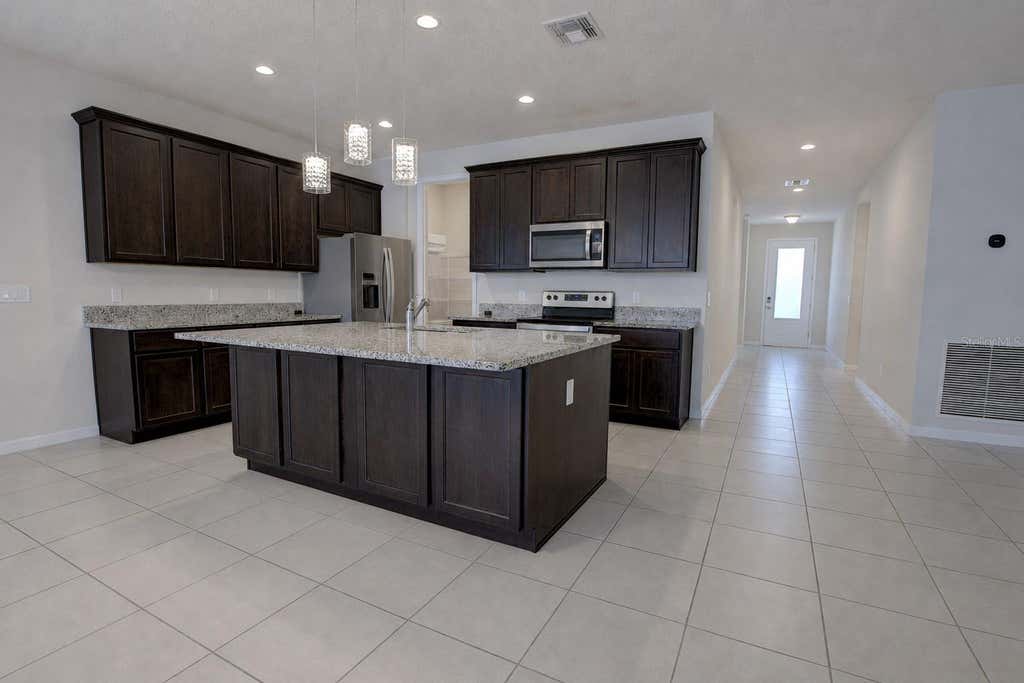 Photo of 3552 Stonebriar Lane, Sanford, FL 32771 (MLS # O6436312)