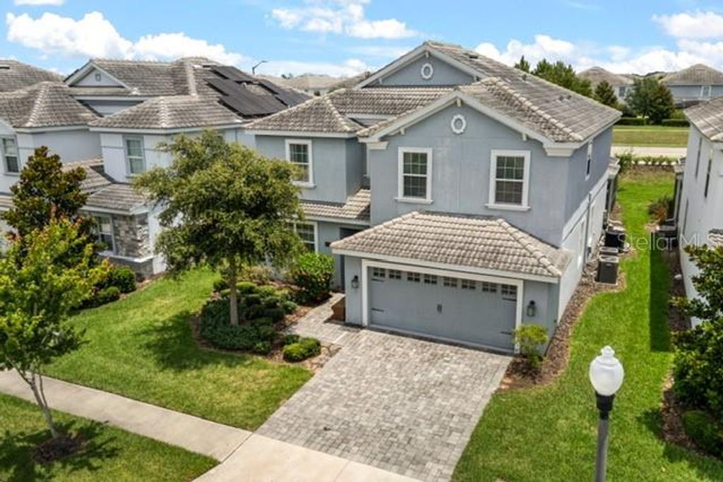 Photo of 8909 Stinger Drive, Champions Gate, FL 33896 (MLS # O6402178)