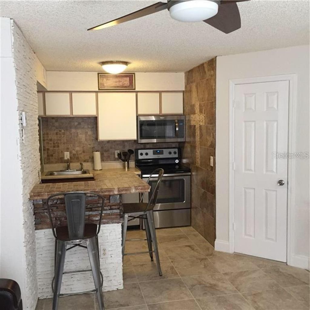 Photo of 2218 Grand Cayman Court #1327, Kissimmee, FL 34741 (MLS # O6376458)