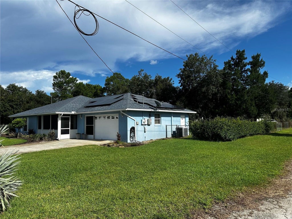 Photo of 5005 Grand Concourse, Sebring, FL 33875 (MLS # A4702087)