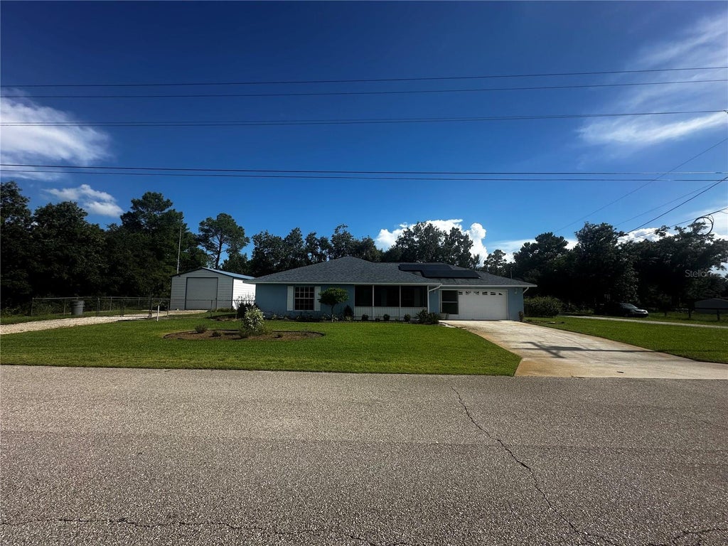 Photo of 5005 Grand Concourse, Sebring, FL 33875 (MLS # A4702087)