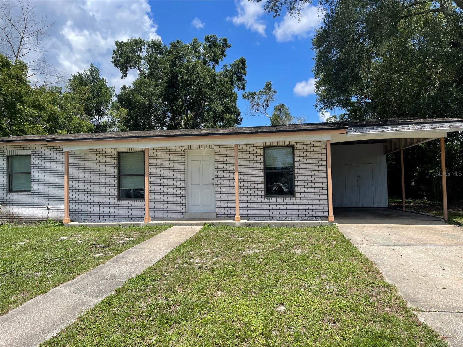 Looking for a cozy home in Deltona. This house checks all the boxes! Newly remodeled kitchen with new cabinetry and stainless-steel appliances. Living room/ dining room combo. Lots of windows for natural light. 2 baths. Bonus room is currently being used as a third bedroom but could be used as a den or home office. Ceramic tile throughout. Outside laundry room is enclosed. Screened in porch for relaxing evenings. Carport. Mature oaks. Close to shopping and easy commute to I-4, Orlando and the beaches.