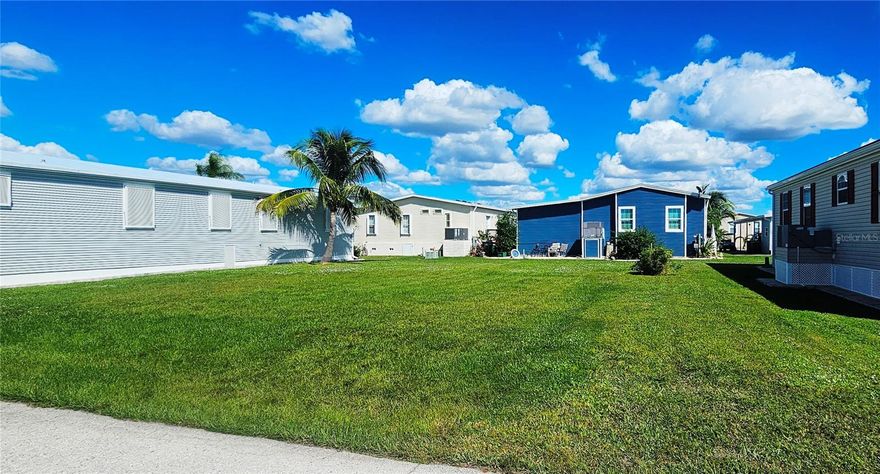 Discover the perfect spot for your custom manufactured home in the highly sought-after 55+ community of Windmill Village!
This vacant lot is already cleared and leveled—ready for you to bring your vision to life. Enjoy a carefree lifestyle with a low monthly HOA fees, which covers water, sewer, trash, and common area upkeep. Windmill Village offers a vibrant, active atmosphere with outstanding amenities, including two private marinas, a boat ramp, shuffleboard, bocce ball, billiards, pickleball, and a spacious community center with a variety of hobby clubs. Relax or host gatherings at The Pavilion beside the heated pool, the perfect place to socialize and unwind.