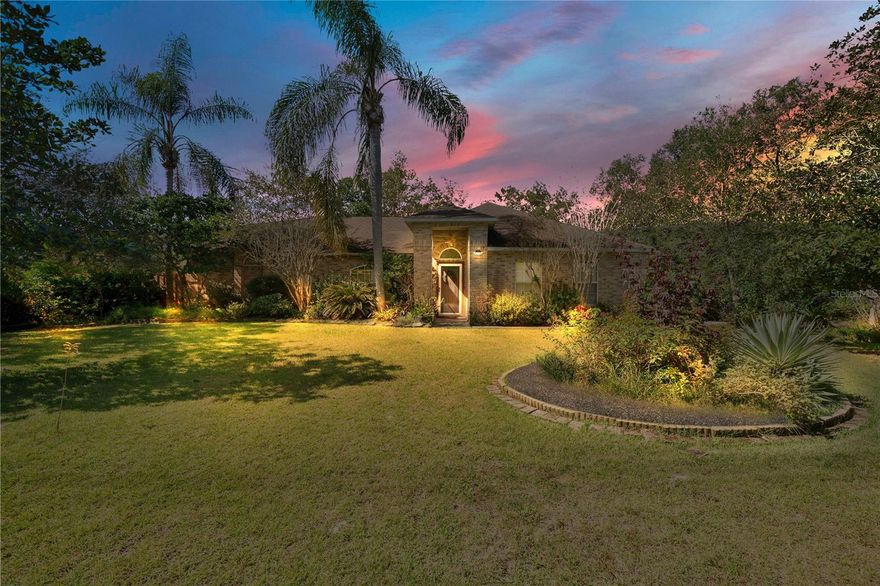 They don’t build them like this anymore! This classic brick beauty sits on a gorgeous 1.22 acres (zoned A-3), privately tucked away in a lovely neighborhood. If privacy while remaining close to everything is what you're looking for, this is the home for you!!

Enjoy the benefits of a FULLY PAID-OFF Whole Home Solar System, well water with a Brand-New Filtration System and Newer Energy-Efficient Windows (3 years old). An extended double-entry driveway and 2-car garage provide plenty of space and convenience. With a little TLC, you can bring the lush landscaping and backyard garden back to life and create your own magical Florida oasis.

Inside, this home features a desirable split floorplan with tile and wood laminate flooring throughout—no carpet. You’ll love the separate living and family rooms, an updated kitchen with tall wood cabinets for extra storage, and beautiful granite countertops that let you cook while overlooking the serene backyard. Host gatherings in the formal dining room or enjoy everyday meals in the cozy dinette area. The wood-burning fireplace adds charm and warmth to the family room on cool Florida winter nights, and the spacious screened-in porch offers the perfect spot to relax and enjoy the peaceful surroundings.

All of this while being less than a 5-minute drive to I-4 and Publix, with endless shopping and dining options nearby. Plus, you’re just 30 minutes to Florida’s beautiful beaches and 45 minutes to Orlando. This home truly offers the best of privacy, convenience, and classic charm.