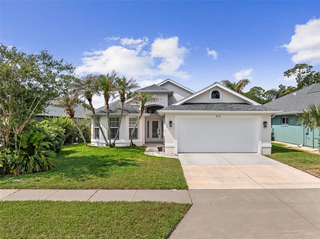 Photo of 912 Countryside West Boulevard, Port Orange, FL 32127 (MLS # V4948953)