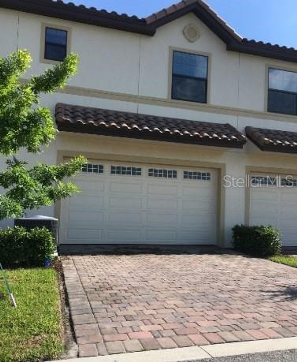 Photo of 10005 Eagle Creek Center Boulevard, Orlando, FL 32832 (MLS # O6366741)