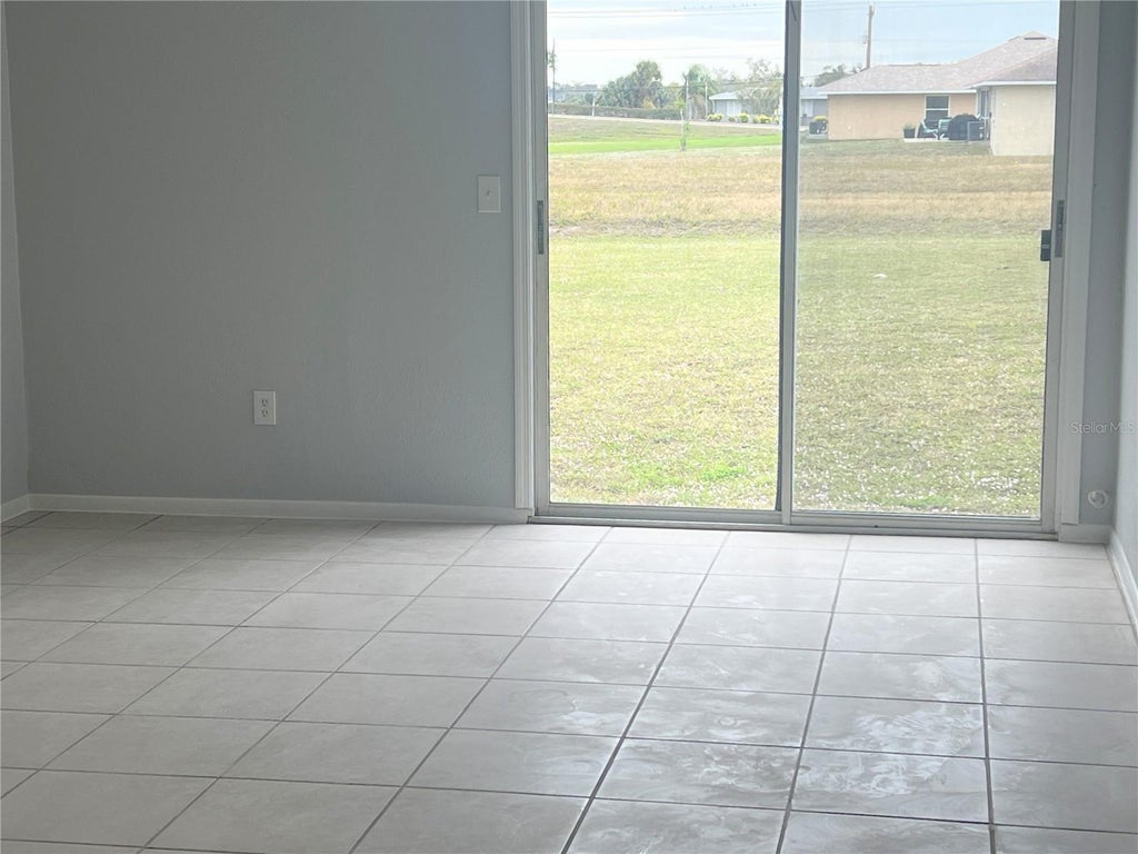 Photo of 212 Boundary Boulevard #C, Rotonda West, FL 33947 (MLS # D6149167)