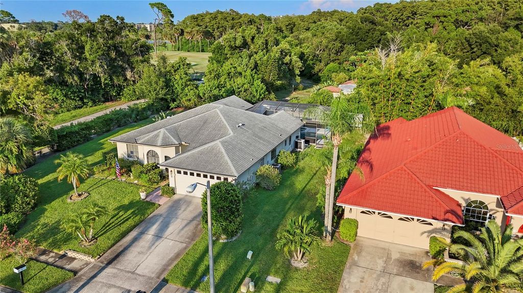 Photo of 1603 Polo Club Drive, Tarpon Springs, FL 34689 (MLS # TB8423121)
