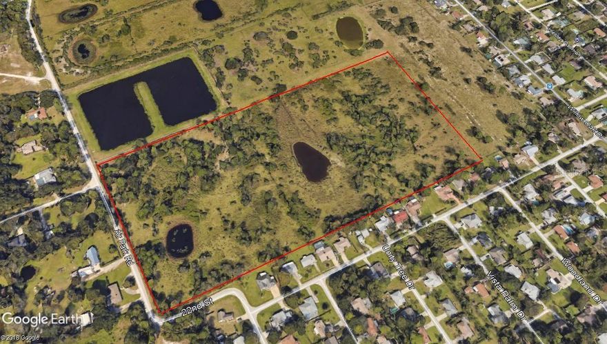 Ideal for residential development.  28.06 Acres of partially cleared improved fenced pasture.  Water is available on Airpark Rd and Sewer is available on the corner of 22nd St.  Property in line for annexation to the city of Edgewater.  Boundary survey is available at office.; Cleared: Partial