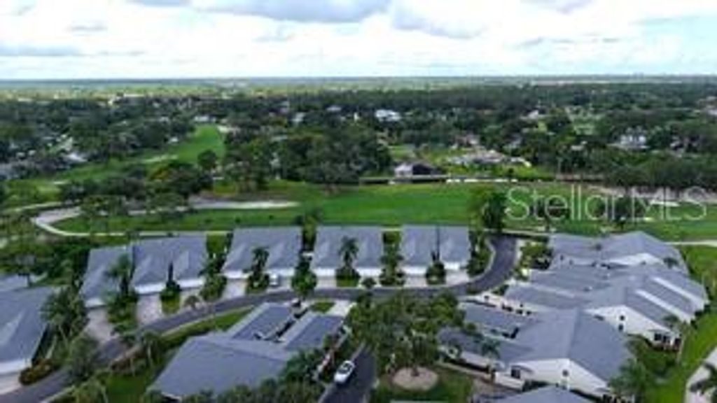 Photo of 5568 Country Club Way, Sarasota, FL 34243 (MLS # A4666779)