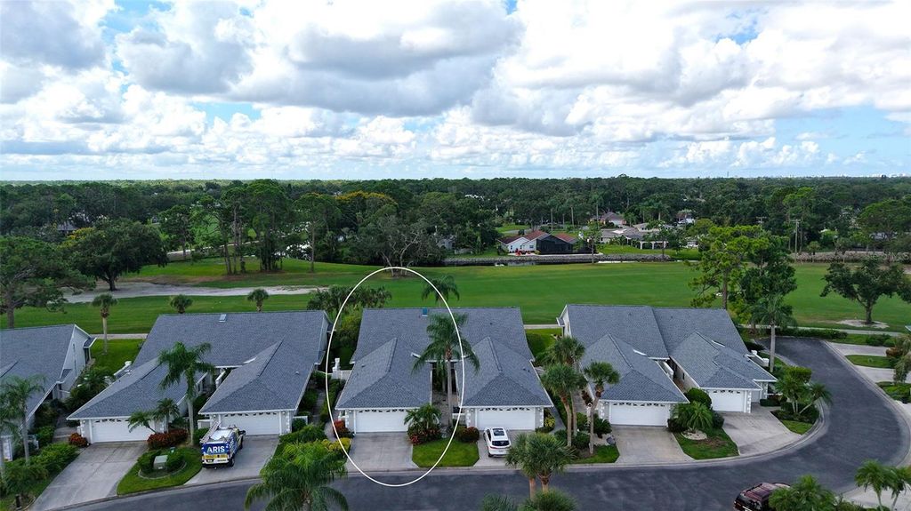 Photo of 5568 Country Club Way, Sarasota, FL 34243 (MLS # A4666779)