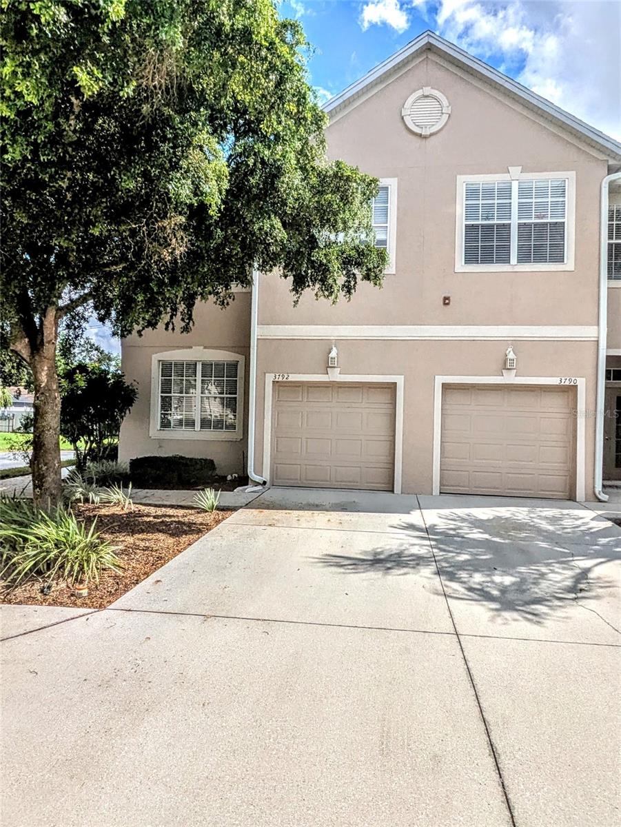 Welcome to this spacious and inviting 3-bedroom, 2.5-bath end-unit townhome located in a peaceful Sarasota neighborhood. As you enter, you’ll find a versatile den/office perfect for working from home or a quiet reading space. The open living and dining room combination offers a bright and flexible layout, while the large kitchen includes its own eating area and plenty of room to cook and entertain. Durable tile flooring flows throughout the entire downstairs level for easy maintenance. Upstairs, all three bedrooms offer privacy, with the primary suite featuring a generous walk-in closet and an en-suite bath complete with a garden tub, separate walk-in shower, and dual vanity sinks. The washer and dryer are also conveniently located upstairs. Step outside to enjoy the screened-in lanai, perfect for relaxing with morning coffee or winding down at the end of the day. A large green space sits right across the street, giving you extra room to enjoy the outdoors. The home also includes an attached one-car garage. This well-maintained, pet-friendly community includes access to a sparkling pool and is located near highly rated schools, beautiful parks, and popular golf courses. Best of all, you’re just 20 minutes from world-famous Siesta Key Beach, making it easy to enjoy everything the Sarasota area has to offer. This home is ideal for families or professionals seeking comfort, convenience, and a welcoming neighborhood. Please call your agent today to schedule a private showing!