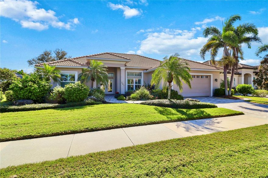 Impeccable curb appeal and refined Florida living await you at 261 Venice Palms Boulevard. Located in the community of Venice Palms, just minutes from “Venice Island”, this residence captures timeless style and meticulous care. Framed by lush tropical landscaping, a paver driveway and walkway, and a durable barrel tile roof, the home makes a stunning first impression!
Beautifully appointed with 3 bedrooms, 2 baths, and just over 2,100 square feet of refined living space, the open, light-filled layout features volume ceilings detailed with crown molding, tile flooring laid on the diagonal in the main living areas, and rich hardwood floors in all bedrooms. 
A large chef’s kitchen showcases natural wood cabinetry, granite countertops, stainless steel appliances, and a generous breakfast bar that seamlessly connects to the main living area—perfect for entertaining. The great room is anchored by a custom-built TV console with display shelving, creating both a beautiful focal point and functional storage. The primary suite offers a peaceful retreat with large glass sliding doors opening to the pool, a built-in wall dresser, dual closets, and a spacious ensuite bath.
Enjoy the tranquil setting of the screened lanai, where a saltwater pool with a new heat pump invites year-round enjoyment and comfort. The pool cage has been recently rescreened, and the lanai is fully equipped with accordion-style hurricane shutters for protection and peace of mind. Recent upgrades to this home include impact-rated front windows (2025), a new A/C system (2023), and a Culligan whole-house water softening system with reverse osmosis at the kitchen sink. Additional features include a central vacuum system, custom lighting, tinted windows, hurricane protection throughout, and a recently updated water heater.
Located within a beautifully maintained community with no CDD fees and modest HOA dues that cover lawn service, fertilizer, pest control and irrigation. Community has a paved .67 mile bike/walking path and a community-owned filtered well system for irrigation. This home allows you to enjoy a truly relaxed lifestyle. 261 Venice Palms combines timeless appeal with quality upgrades and a serene natural backdrop, exemplifying luxury, comfort and attention to detail.