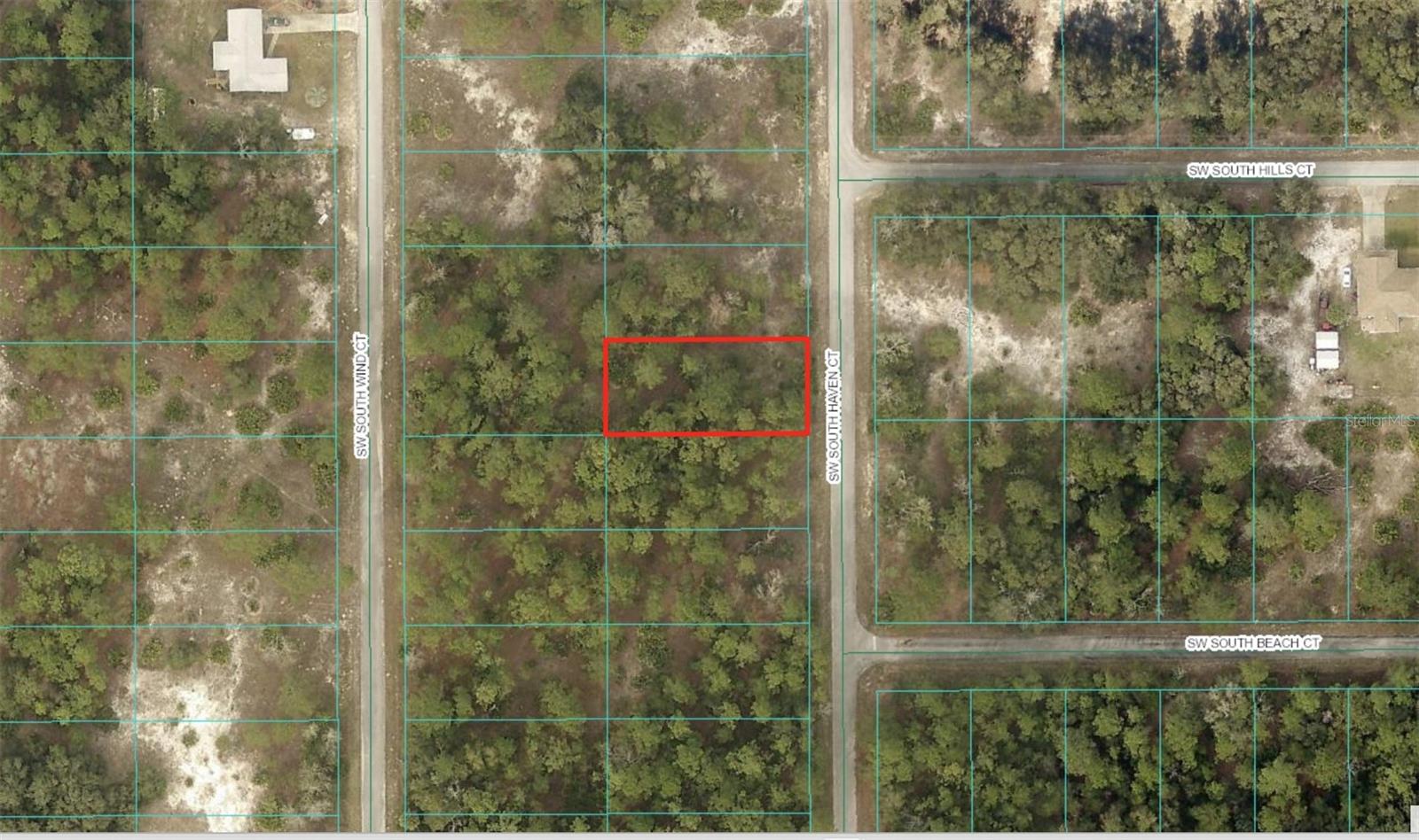 1/4 ac located in Rainbow Lakes Estates close to Tiger Lake.