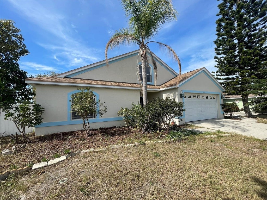 Photo of 10127 Barnett Loop, Port Richey, FL 34668 (MLS # TB8550632)