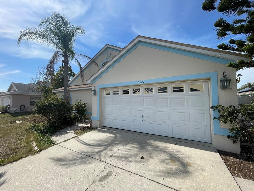 Photo of 10127 Barnett Loop, Port Richey, FL 34668 (MLS # TB8550632)