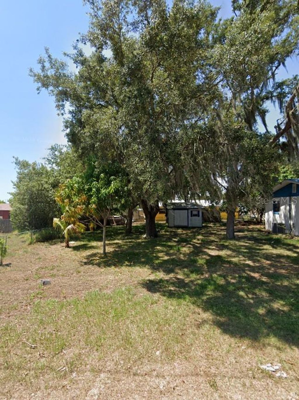 Photo of 405 Wl Kirkland Street, Avon Park, FL 33825 (MLS # TB8371892)