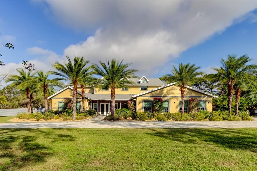 This exceptional 6,727 sq ft executive estate offers an unparalleled blend of luxury, comfort, and modern sophistication. Nestled in the heart of Pinellas, this hidden gem community boasts approximately 70 estate-style properties, each set on expansive 2+ acre lots, providing privacy and tranquility in a non-flood zone setting.
Built in 2022, this custom home showcases an open-concept design, perfect for both large scale entertaining and everyday elegance. At the heart of the home lies a gourmet kitchen, centered around the 22-foot island, offering ample space for culinary creations and casual gatherings alike. The expansive living room accommodates an oversized sitting area and a baby grand piano, while overlooking the sparkling pool and serene backyard oasis. The formal dining area comfortably seats 12 — ideal for hosting unforgettable events.
Step outside into your private retreat, featuring a ~30,000-gallon solar-heated saltwater pool and spa. An outdoor kitchen invites you to enjoy al fresco dining, while generous lounging areas provide the perfect backdrop for relaxation and entertaining.
The luxurious ground-floor primary suite is a haven of comfort, complete with dual walk-in closets, spa-inspired bath, split vanities, and a rain shower. Also on the main level is an oversized fitness room with an adjacent bath, offering the flexibility to serve as a second primary suite or in-law quarters. Additional ground-floor amenities include an oversized executive home office, two guest bedrooms, and a full bath.
Upstairs, the 1,761 sq ft second level offers a thoughtfully designed layout with three bedrooms, 2 full baths, a bonus room, and a study.
Crafted with the finest materials and top-tier appliances, this home also boasts hurricane-impact windows, a whole-house generator, zero-entry showers and doors, and a state-of-the-art security system — delivering both luxury and peace of mind.
This estate embodies the perfect balance of elegance, functionality, and serenity. Don't miss your chance to own this one-of-a-kind property in a premier location. Schedule your private tour today and step into the extraordinary.  Sellers open to lease purchase.