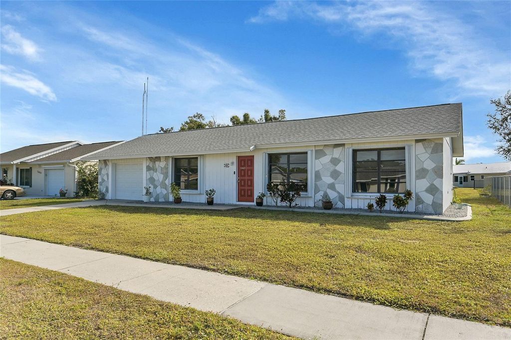 Photo of 13427 Romford Avenue, Port Charlotte, FL 33981 (MLS # C7518346)