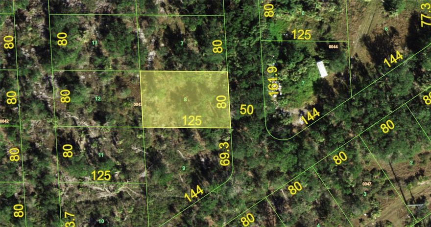 An exceptional land investment opportunity awaits in the peaceful Tee & Green Estates neighborhood of Punta Gorda. This prime 9,978-square-foot vacant lot measures 80ft by 125ft (0.23 acres), offering a blank canvas for buyers looking to secure a piece of SWFL real estate at an incredible value. The property sits in a quiet, developing pocket of the community that is currently unimproved with no direct street accessibility at the moment, making it an ideal buy-and-hold piece or a strategic speculative addition to your real estate portfolio. When you are ready to build, a future home here will utilize a private well and a septic system. Best of all, buyers can move forward with complete confidence because this parcel IS NOT located in a designated scrub jay review area and contains NO WETLANDS, drastically streamlining your future planning process and eliminating costly environmental mitigation hurdles. 

Despite its quiet, off-the-beaten-path feel, this property boasts an unbeatable location that keeps you connected to all the major conveniences and world-class attractions of the region. Commuters and regional travelers will love being just a few minutes from Interstate 75, providing fast and seamless highway travel north and south throughout the entire state. Even better, the property is located just down the street from the Punta Gorda Airport (PGD), making travel a breeze for incoming guests or quick weekend getaways. You are also just a short drive from the historic charm of Downtown Punta Gorda, where you can spend your days exploring its vibrant waterfront, checking out local boutique shops, and dining at restaurants in Fishermans Village and throughout the rest of the City.

For those who thrive on the water or love the outdoor lifestyle, this location is an absolute dream. The lot sits in incredibly close proximity to both the Laishley Park Boat Ramp and the Darst Park Boat Ramp, offering incredibly easy access to launch your boat, kayak, or jet ski into the Peace River and Charlotte Harbor for world-class fishing and boating adventures. The area features multiple top-tier golf courses within a 20 minute drive, catering perfectly to the avid golfer looking for a sunny day on the fairways. Whether you are searching for a smart, long-term land investment or planning a future home in a rapidly growing coastal region, this exceptional Punta Gorda lot offers the perfect mix of price, potential, and lifestyle.